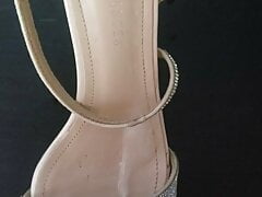 Cumshot on neighbor's high heels