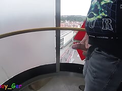 I jerk my cock very riskily in a public, transparent outdoor elevator on the 13th floor.