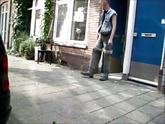 great guy in waders, rubber boots, mud and overall