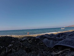Swimming on the nude beach of Santorini, Greece