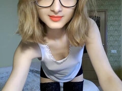 Cute teen Lina in glasses on webcam