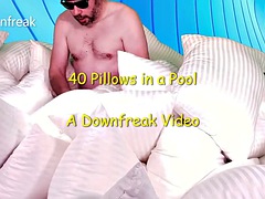 Pillow fucks 40 pillows in an inflatable pool