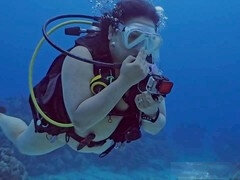 Naked duo has some fun scuba diving together