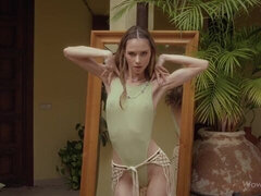 Skinny and young hottie Leona Mia is touching her shaved pussy