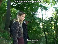 Blonde babe does blowjob in the forest