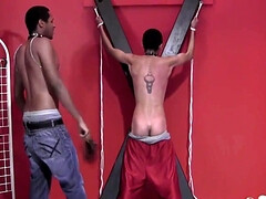 Lucas is tied up and whipped by the black stud