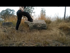 naked on a big rock
