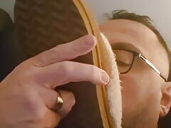 Sniffing and playing with slippers