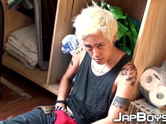 Blond Japanese twink toys with hole and strokes his dick