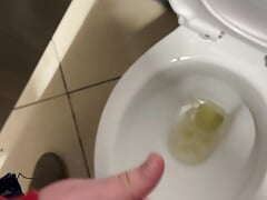 Wanking my hard cock off and shooting my cum all over the toilet