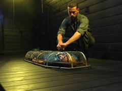 Caged male slave lets master feast with his erect cock