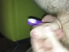 Slave plays with his clitty (with pegs attached)