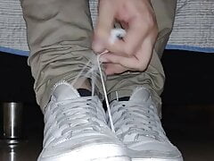 salesman shows his feet after a long day of work