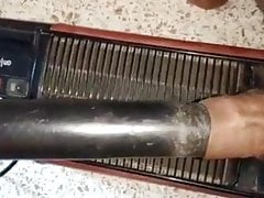Desi Dick in vacuum cleaner