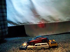 Shooting cum on a pile of matchbox cars