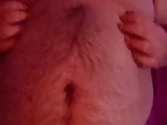 hairy chub plays with tits, belly, and cock