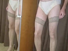 Crossdresser posing in various Lace Underwear sets