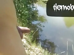 Naked Twink In The River Is Pissing And Cumming