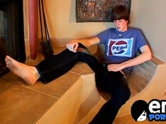 Skinny twink wanks off and cums in his lustful mouth