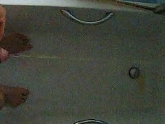 Pissing in bath whilst standing up