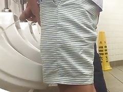 Circumicised big penis urinating close-up