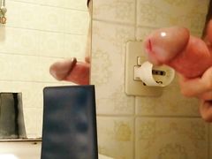 Homemade amateur handjob and cumshot on card holder