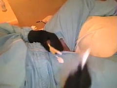 cockstuffing with catheter in full rubbersuit ( 2)