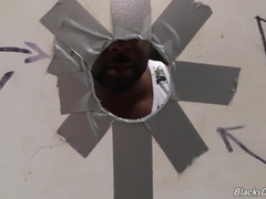 Bearded guy sucks a ebony meat at a gloryhole