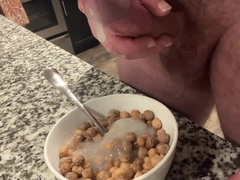 Suspended Bodybuilder Splatters Numerous Popshots Into Cereal
