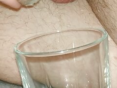 Quick handjob and a powerful eruption of sperm in a glass! CLOSE-UP