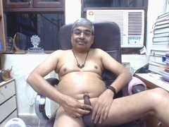 Middle-aged Dr. Kamesh gives himself a handjob with a soothing Indian body massage