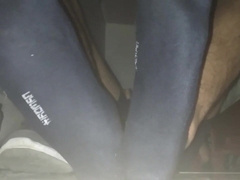 Blue Sweat-soaked socks and barefeet with popshot