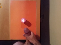Hand Job and cum-shot on a candle. Stroking offf and attempting to change off the flame
