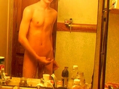 Curly-haired youngster in douche