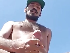 He wanks naked Outdoors