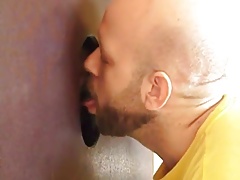 Hot sucking action at the homemade glory hole 8