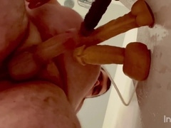 Curious and exhibitionistic wolf enjoys a steamy shower play for some cash