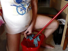 John is peeing into the cleaning bucket