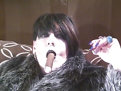 Fur and a cigar.