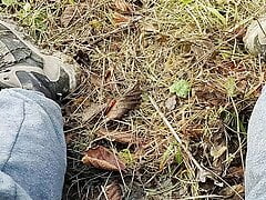 Bear outdoors in the woods gets his dick out and cums