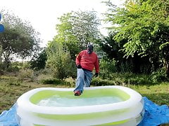 Baggy Pup cooling down in pool (with sneakers and cumshot)