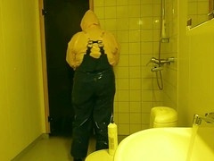 gay man in pvc rainwear