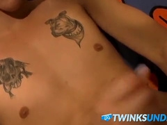 Tattooed twink wanks while wearing his favorite undies