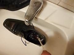 Piss in men's dress shoe