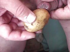 Foreskin with cum inside, and a potato