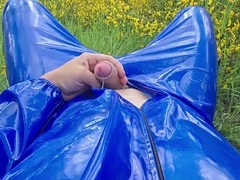 Jerk off and pee in a blue PVC suit