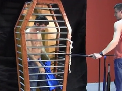 Caged boy lets his horny master play the kinkiest games with him