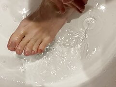 Steve Ford washes feet