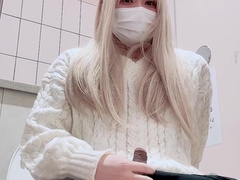 A lady-like fellow strokes in a public toilet