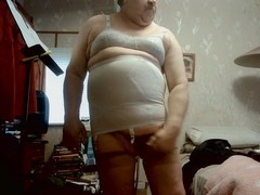 Plump chick from WIENER indulges in some playful tugging and teasing with a small cock
